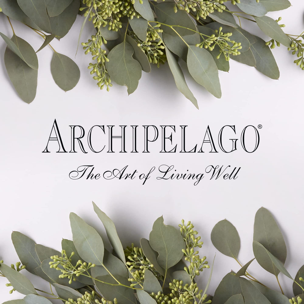 Archipelago Botanicals bottle lit from side emphasizing color and premium packaging quality