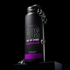 Art of Sport in-shower lifestyle shot showing athlete using two-in-one cleanser after workout