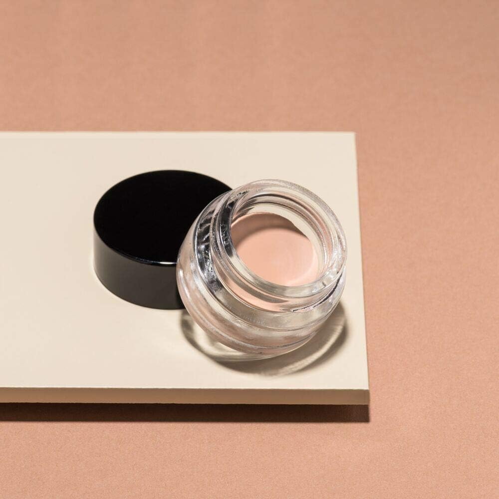 ARTDECO primer inside a makeup bag showing convenience for daily routines