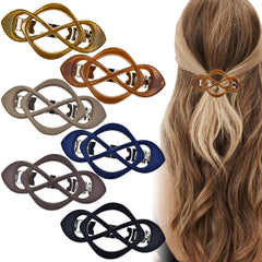 Arvintas front packaging view showing six matte claw clips for versatile styling