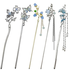 Arvintas front view set showing five silver hair sticks and decorative motifs for styling