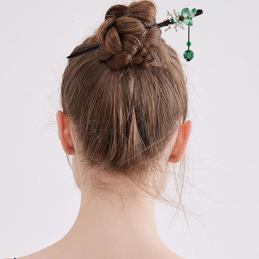 Arvintas hair sticks securing an elegant bun, demonstrating reliable hold and decorative flair