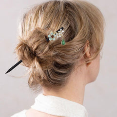 Arvintas hair stick next to a ruler showing length for versatile updos and stable support