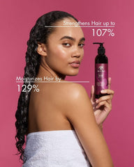 As I Am pouring conditioner onto palm for easy detangling