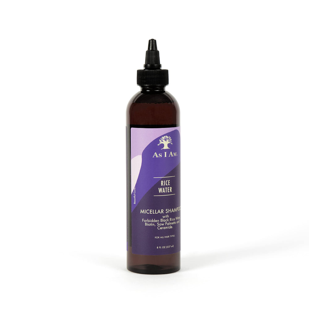As I Am shampoo pump in hand showing easy dispensing and convenient use