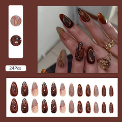 ASABITE close-up of butterfly wing design on brown press-on nail highlighting decorative detail