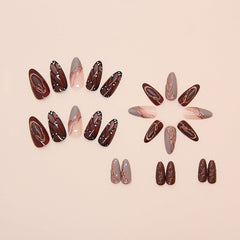 ASABITE nails in hand to show scale and fit for natural-looking almond manicure