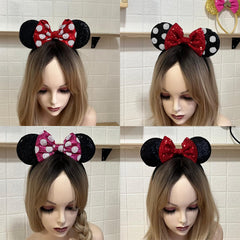 ASAHEL close-up of shiny bow and ear seam, highlights durable construction