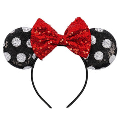 ASHONE front view headband with red bow showing festive finish