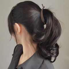 Aswewamt clip in hair demonstrating a French twist and comfortable wear