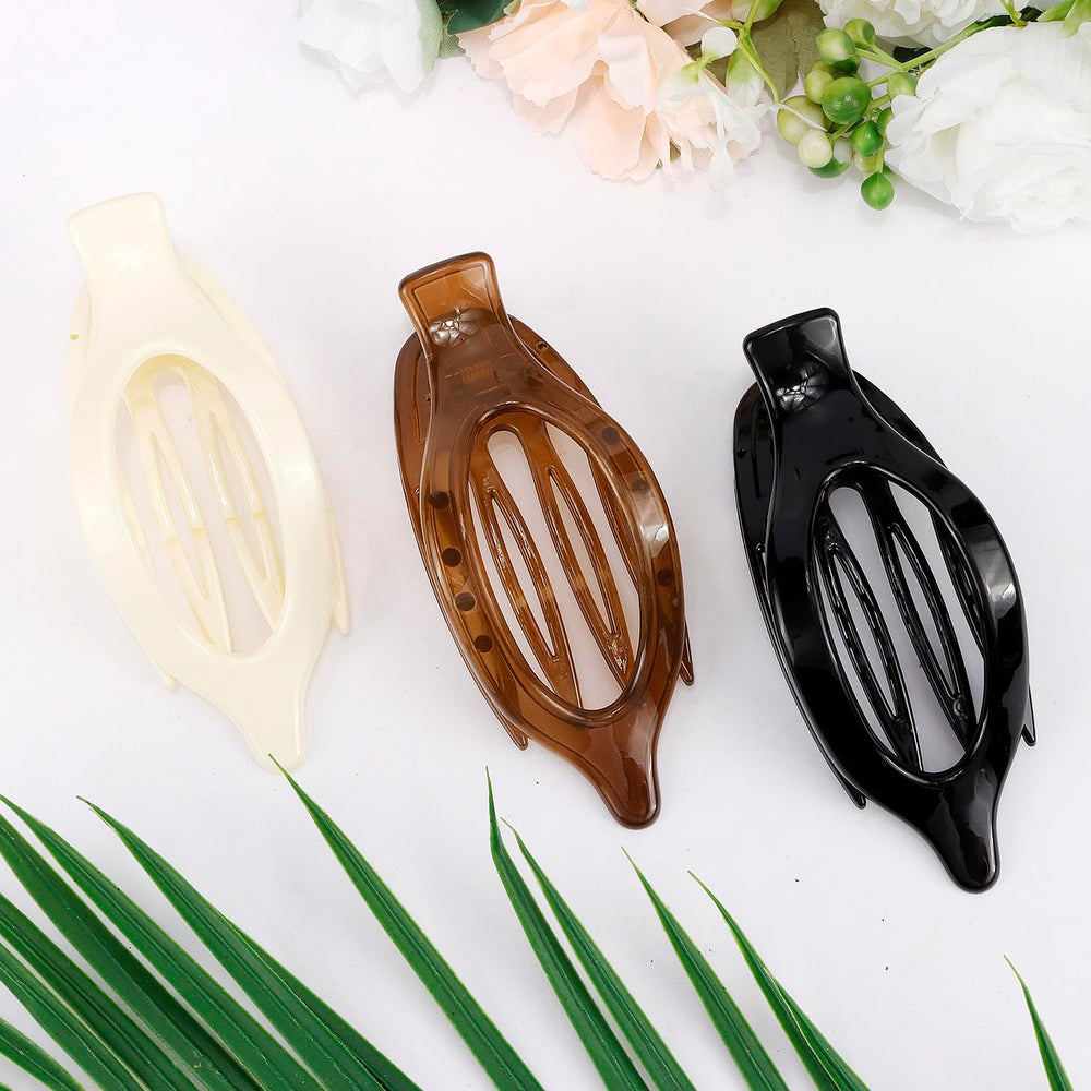 Atoden clip worn by woman in cafe offering stylish practical hold