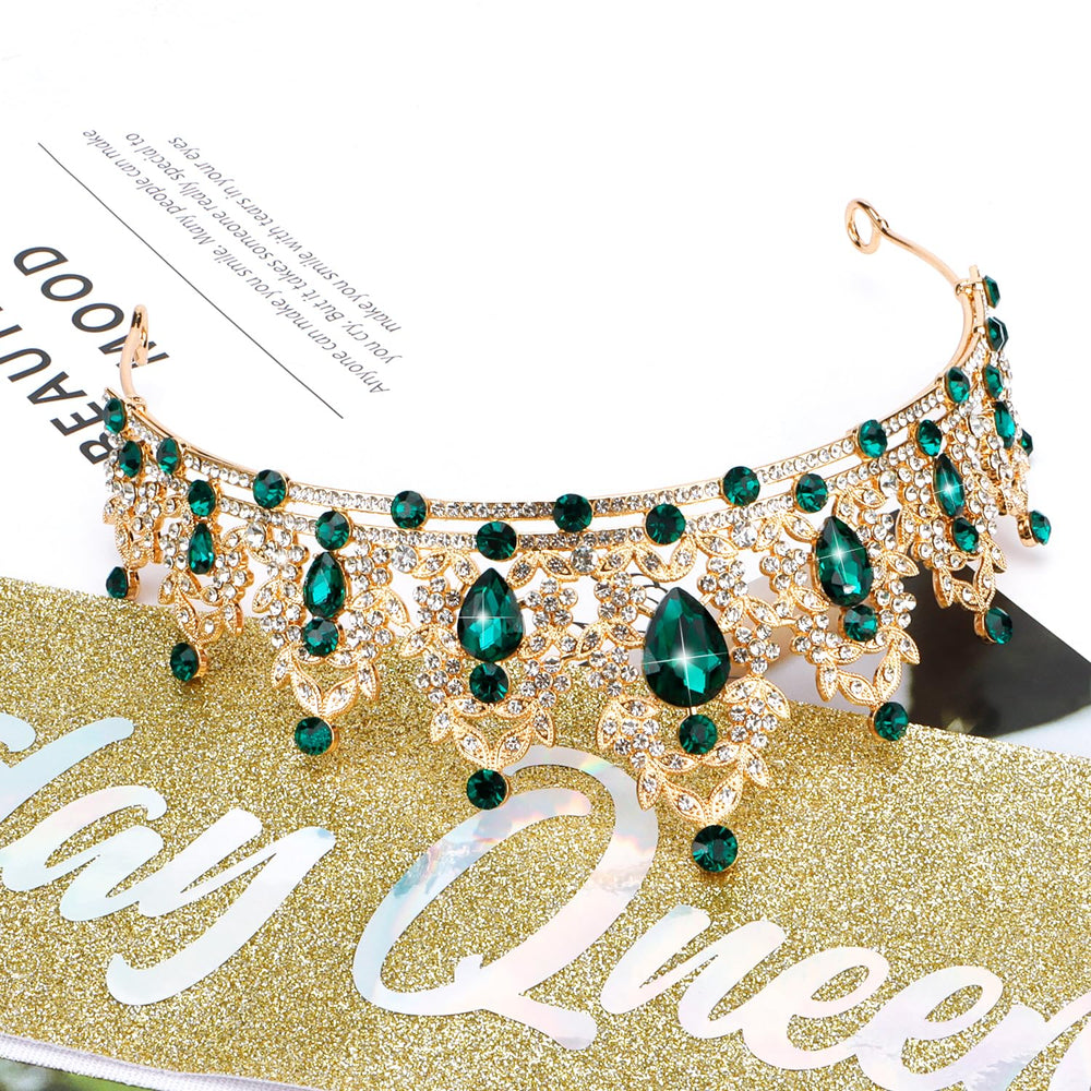 Atoden packaging and accessories showing crown, sash, and included safety pin