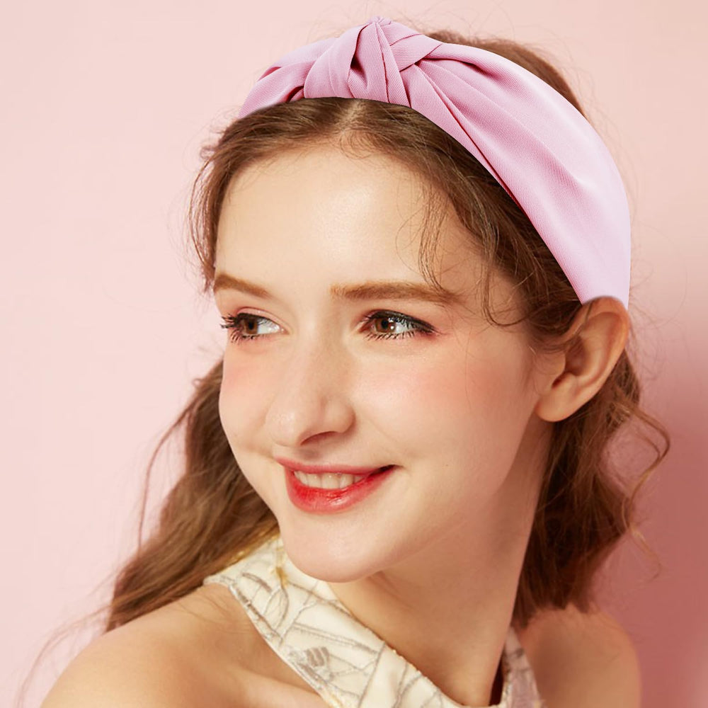 Atoden headband worn with a bun demonstrating style lift and all‑day hold