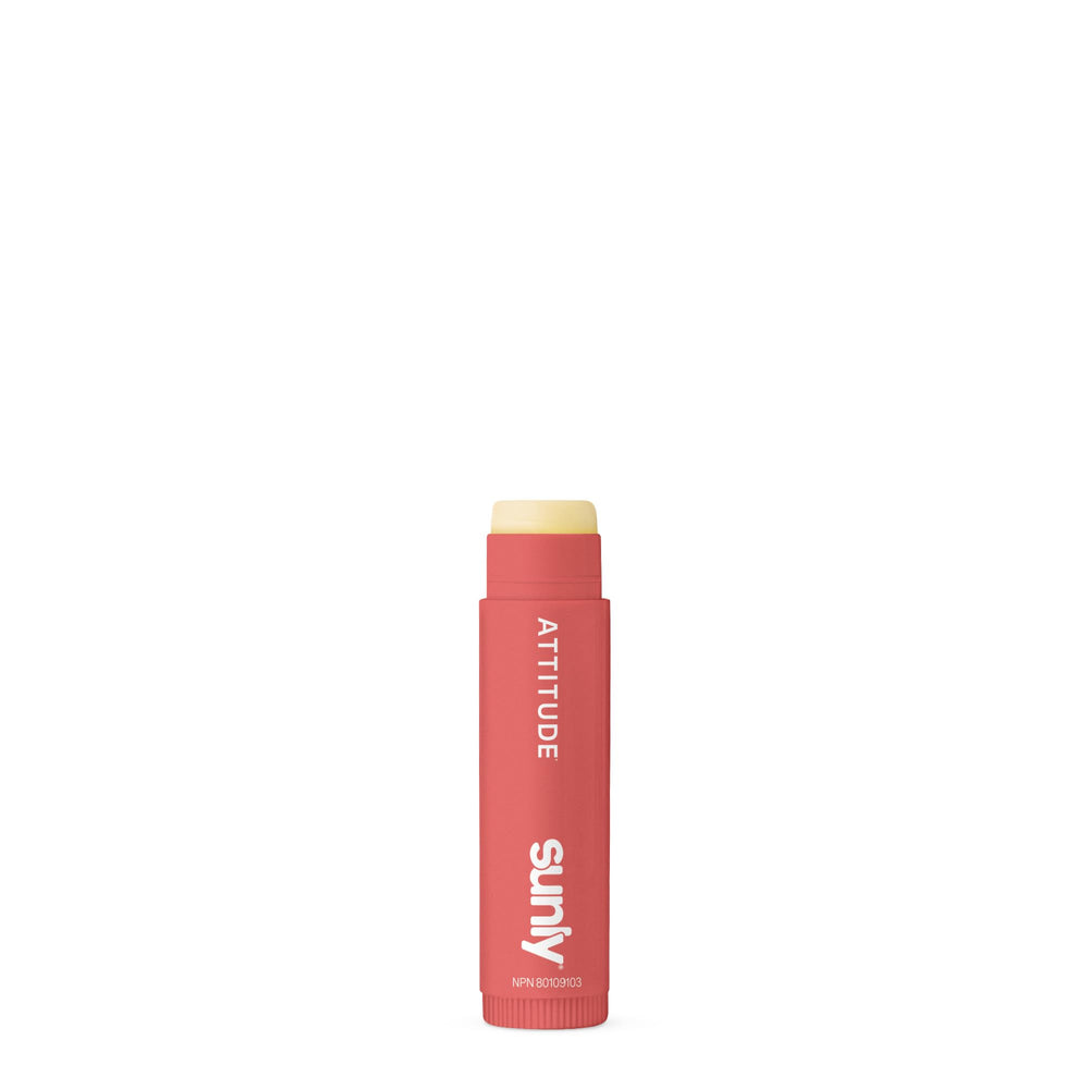 ATTITUDE applied to lips demonstrating hydrating, non-sticky finish