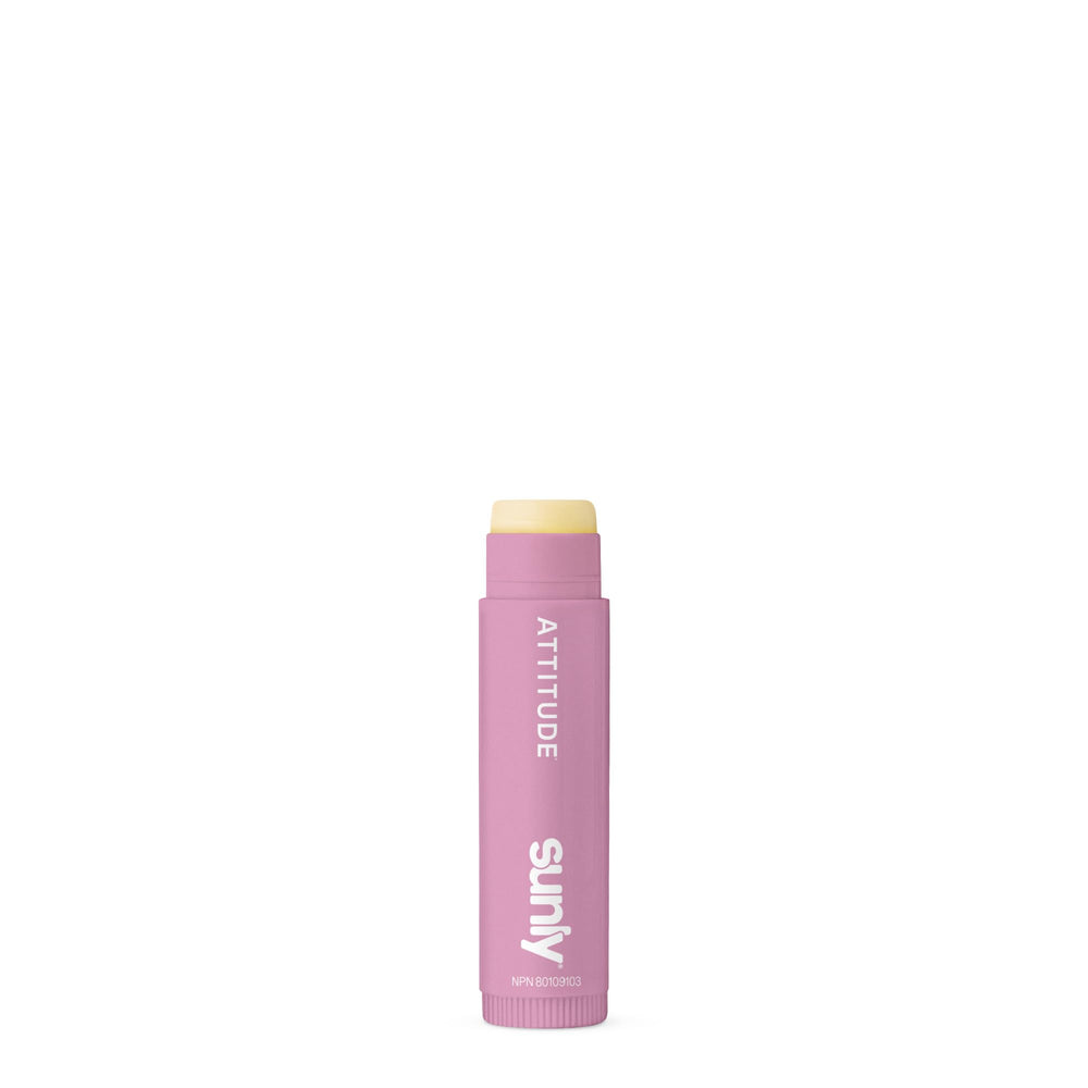 ATTITUDE applied outdoors on lips illustrating hydration during sun exposure