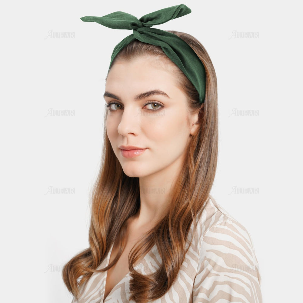 AUEAR headband laid flat beside ruler showing 77 x 5 cm size accuracy