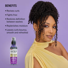 Aunt Jackie's applying serum to mid-lengths, restores curl definition benefit