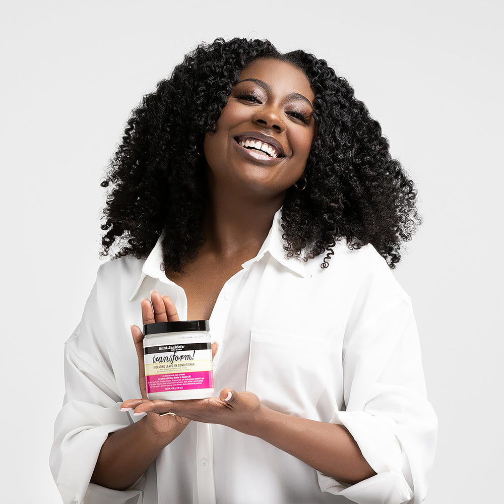 Aunt Jackie's cream in hand showing amount to use and improved comb‑through ease