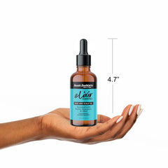Aunt Jackie's smoothing oil through ends to reduce breakage