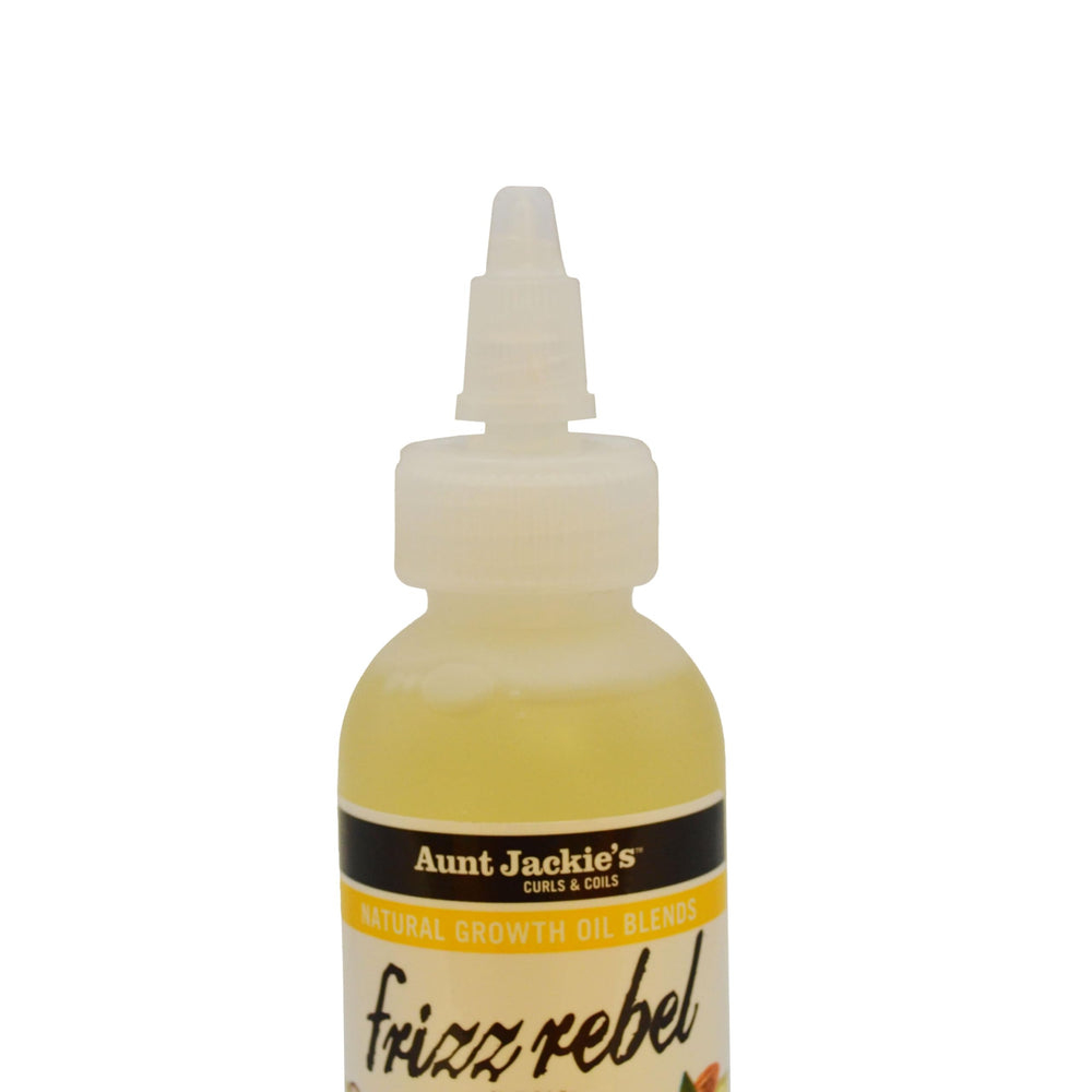 Model applying Aunt Jackie's to hair ends showing frizz control and added shine