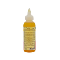 Aunt Jackie's oil pour close-up revealing lightweight texture and easy absorption benefit