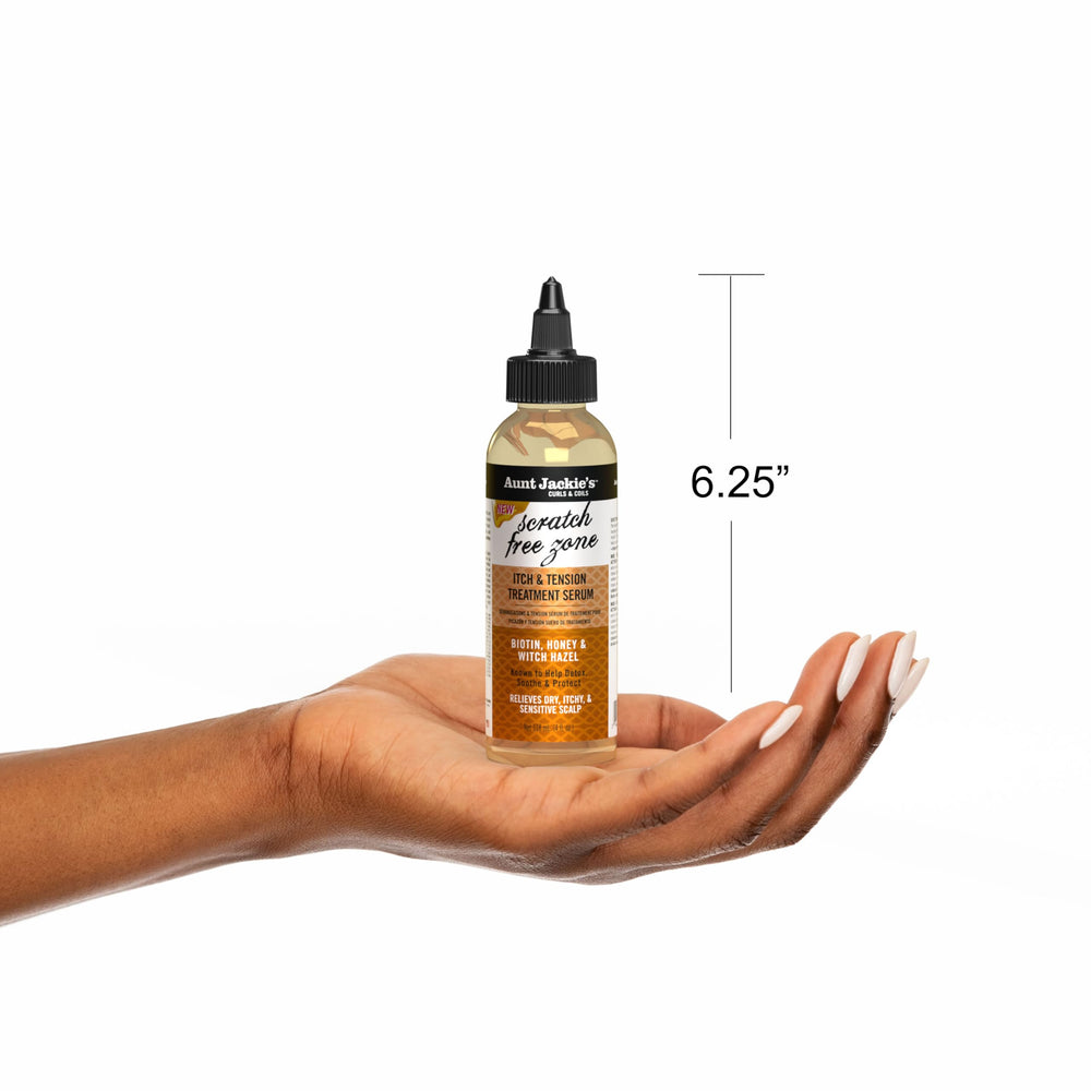 Aunt Jackie's treated braids with visible shine and smoother scalp appearance after use
