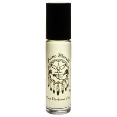 Auric Blends Love perfume oil front bottle close-up showing compact roll-on applicator