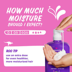Aussie conditioner being applied in wet hair to improve manageability and shine