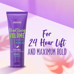 Aussie Headstrong gel in hand to show 7 oz size and travel-friendly scale