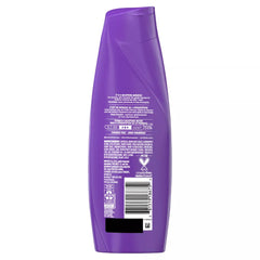Aussie Miracle Moist bottle beside a hand to show 12.1 oz scale