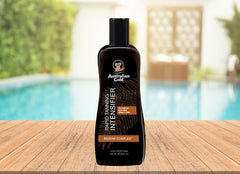 Australian Gold applied in hand demonstrating easy spread and faster tan activation