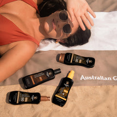 Australian Gold bronzer spread on arm showing immediate golden tint