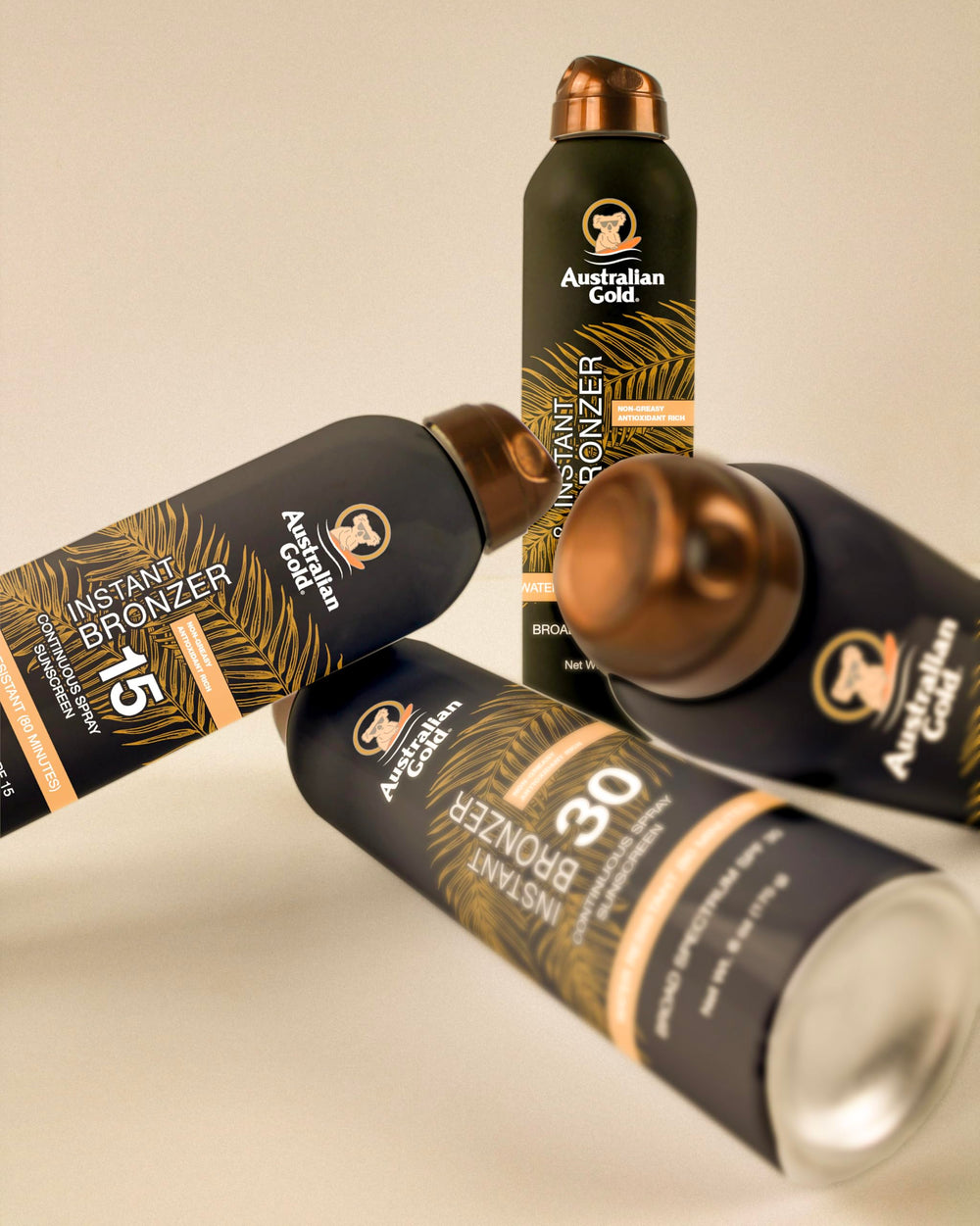 Australian Gold being sprayed on shoulder showing full-coverage application benefit
