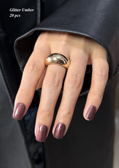 AutyaMee close-up of glitter umber strip texture demonstrating rich shimmer finish