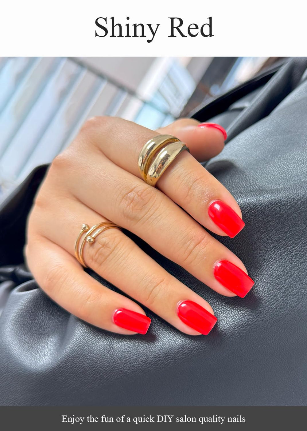 AutyaMee on hand showing red manicure scale and real-gel look