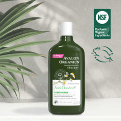 Avalon Organics applying conditioner to scalp for flake control