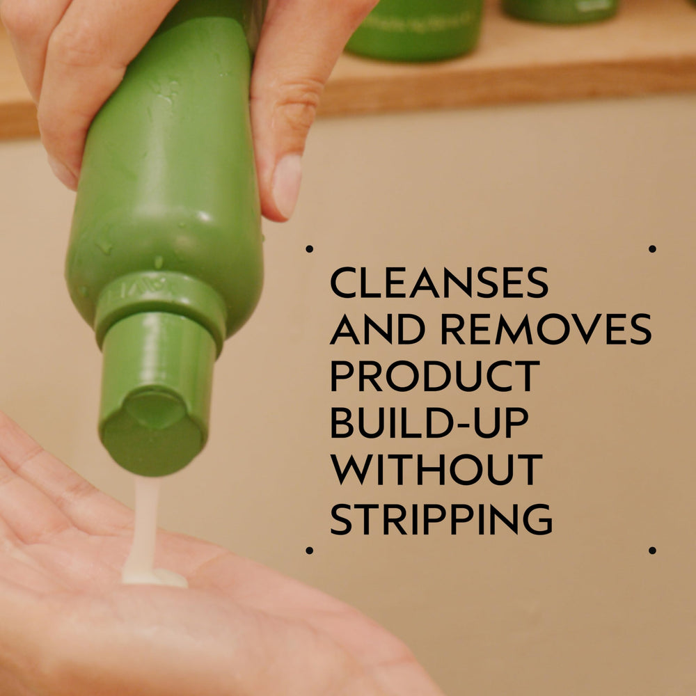 Aveda Be Curly pump close-up highlighting easy dispensing and control