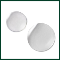 Aveda Beautifying Composition Oil beside bathtub indicating relaxing bath benefit
