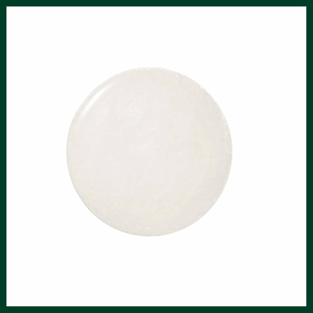 Aveda packaging label showing ingredients list, signals clean formulation benefit