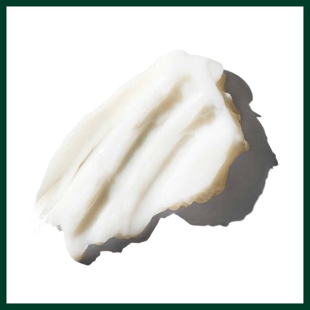 Meadowfoam jojoba and babassu oils with Aveda bottle highlighting natural emollients