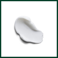 Aveda product beside flat iron illustrating heat protection up to 450°F