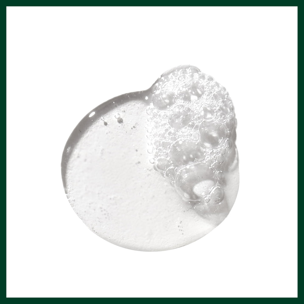 Aveda purifying gel cleanser foamed on hand demonstrating gentle but effective cleanse