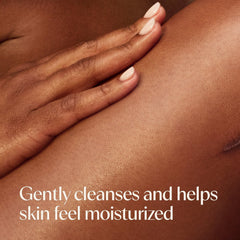 Aveeno label close-up highlighting prebiotic oat and nourishing skin benefit