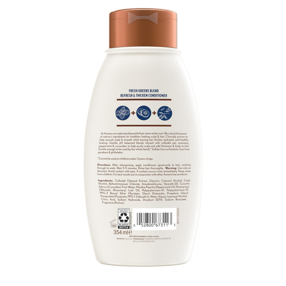 Hand holding 12 fl oz Aveeno bottle to show size and portability