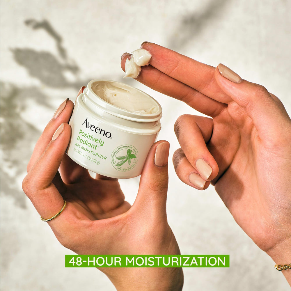 Aveeno moisturizer spread on hand illustrating smooth application and soft skin