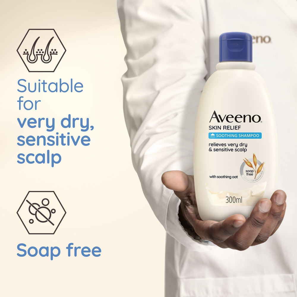 aveeno bottle held in hand showing 300ml scale for travel and storage