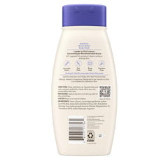 Aveeno bottle held in hand for scale showing convenient 18 fl oz travel-friendly size