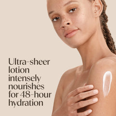 Aveeno lotion texture on hand demonstrating fast-absorbing, lightweight feel