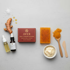 Hand holding Aver kojic acid soap to show lather and gentle use