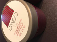 Avon Candid applied to hand demonstrating quick absorption and softness